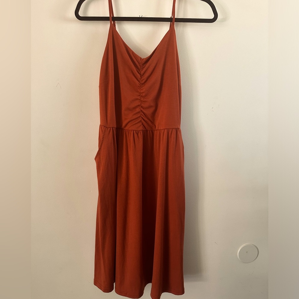 Size Large Terracotta sundress with pockets.